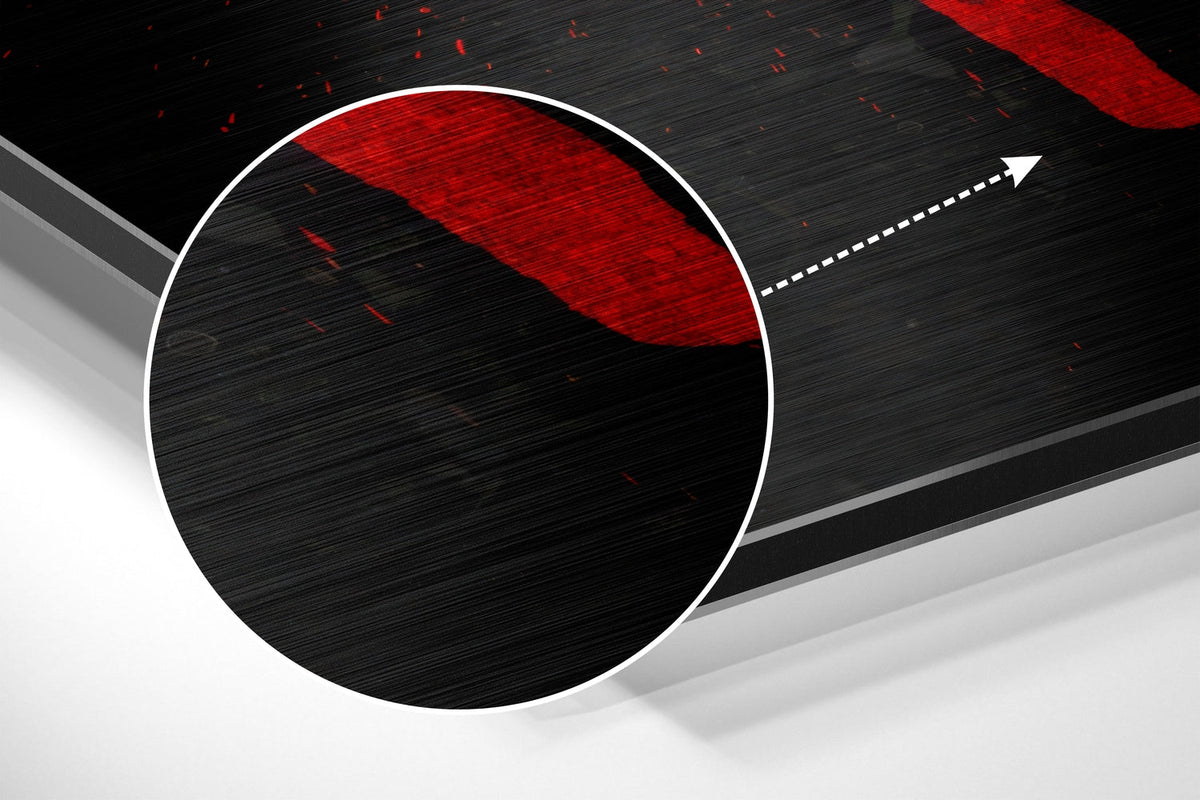 Magnified detail of the brushed metal grain showing through the no pain no gain red dumbbell emblem print