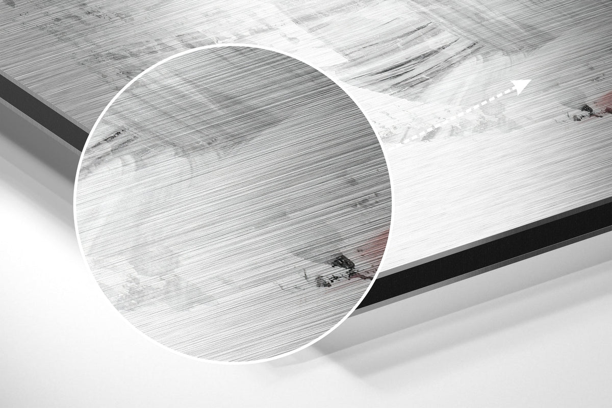 Magnified detail of the brushed metal grain showing through the pink flamingo on white print