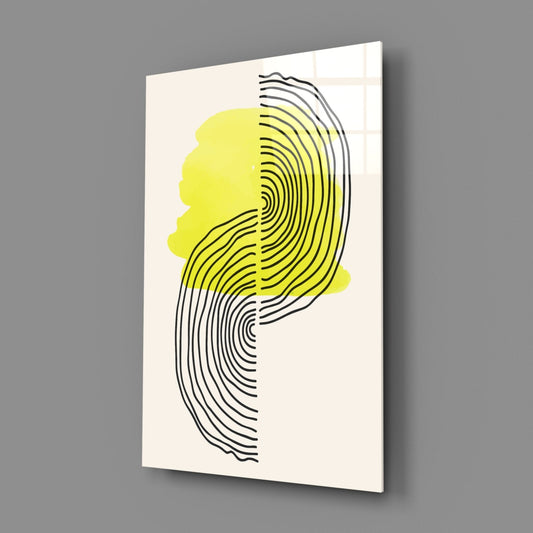 Yellow watercolor sun line abstract glass wall art on a gray wall with soft window light