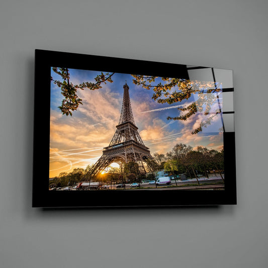 Eiffel Tower at sunset tempered glass print angled against a gray wall