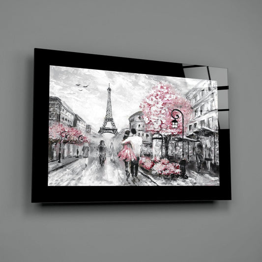Pink and gray Paris couple glass wall art angled against a plain gray backdrop