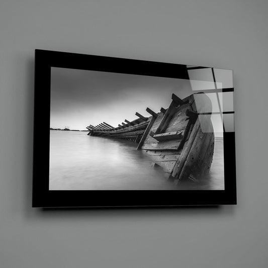 Black and white shipwreck glass wall art shown at an angle against a gray wall