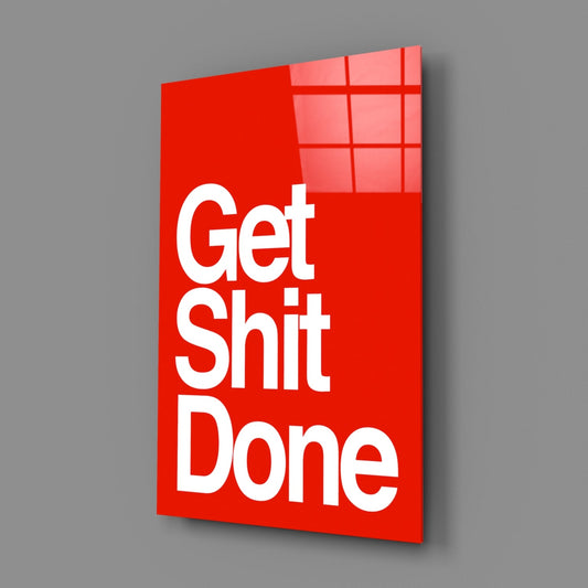 Get Sh*t Done bold white on red glass wall art on a gray wall with a soft shadow