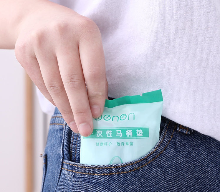 Pocket-size toilet seat cover packet for travel