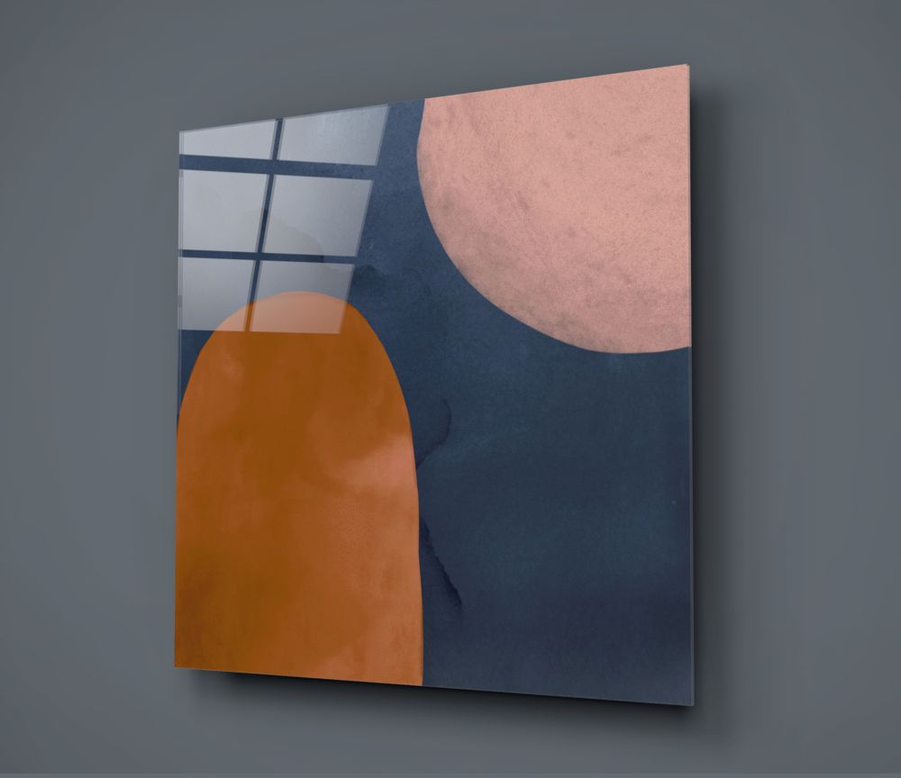 Terracotta arch and navy abstract glass wall art on a gray wall with soft window light