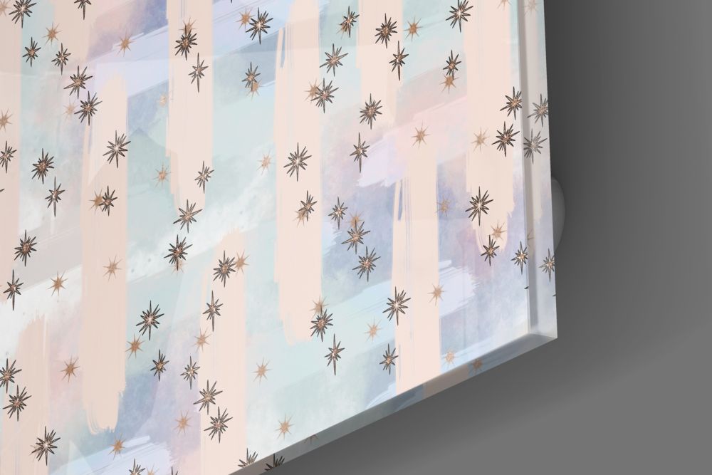 Pastel brushstrokes and gold stars glossy tempered glass edge close-up