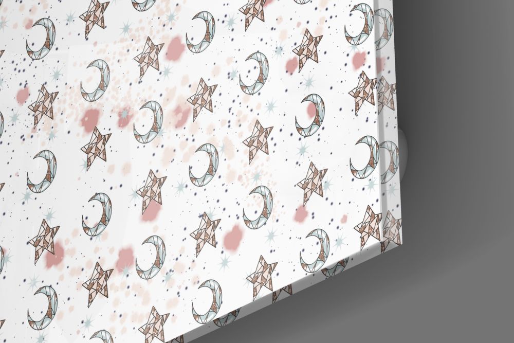 Close-up of the glossy tempered glass edge of the stars and crescent moons pattern piece