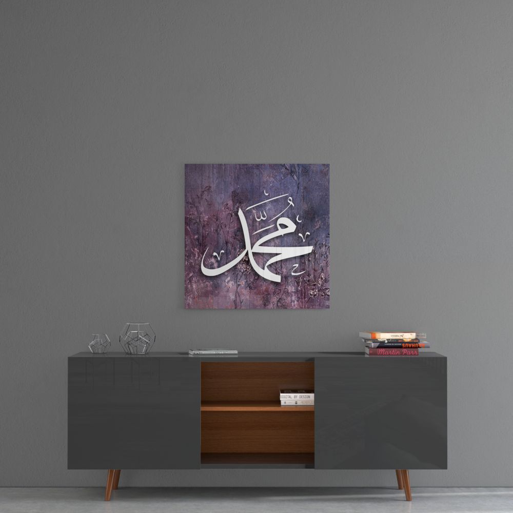 Purple weathered Muhammad calligraphy glass wall art above a gray sideboard with a wooden center shelf