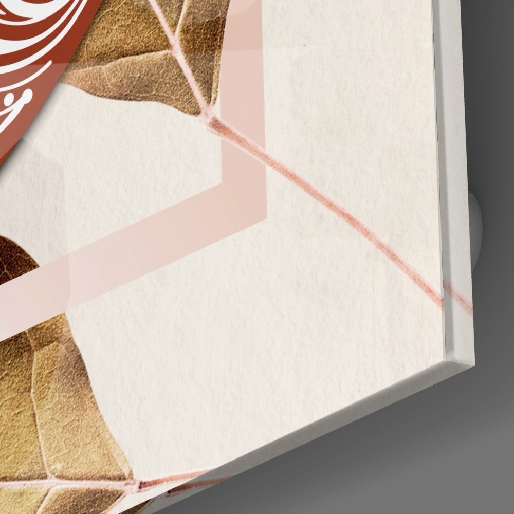Close-up of the glossy glass edge over the cream background and pink leaf