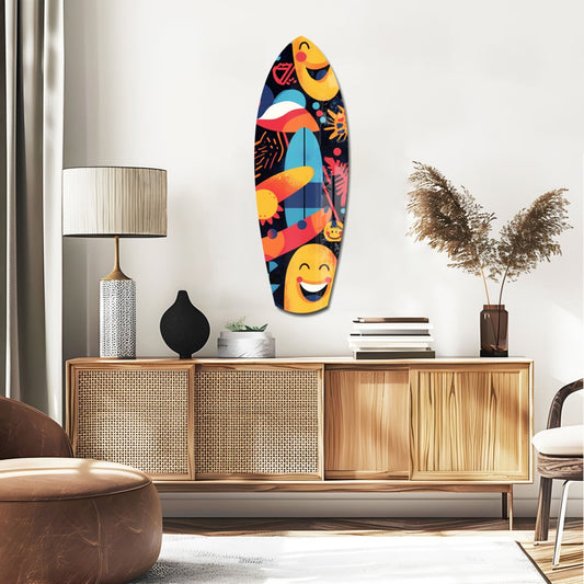 Summer beach surfboard glass wall art above a rattan sideboard with a table lamp and pampas grass