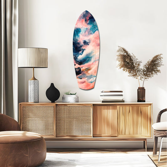 Surfboard glass wall art above a rattan sideboard with a table lamp and pampas grass
