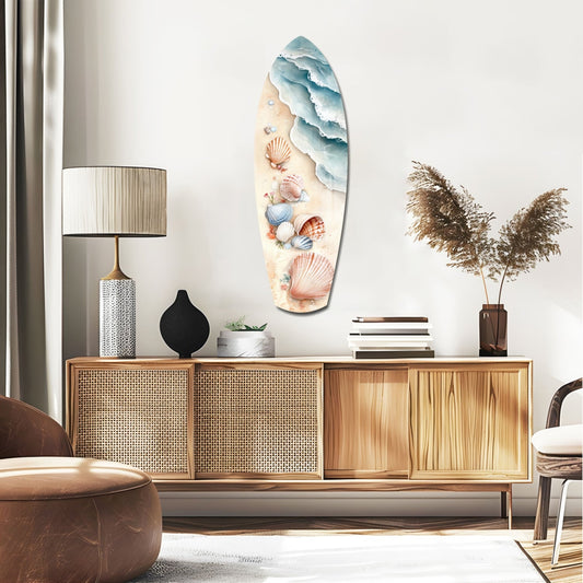 Seashells on the shore surfboard glass wall art above a rattan sideboard with a table lamp and pampas grass