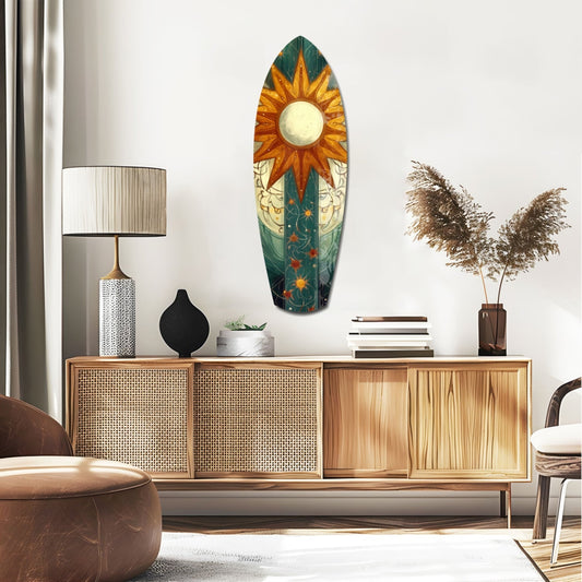 Celestial sun surfboard glass wall art above a rattan sideboard with a table lamp and pampas grass