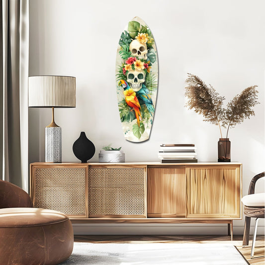 Floral skulls on white surfboard glass wall art above a rattan sideboard with a table lamp and pampas grass