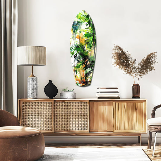 Rainforest palms surfboard glass wall art above a rattan sideboard with a table lamp and pampas grass