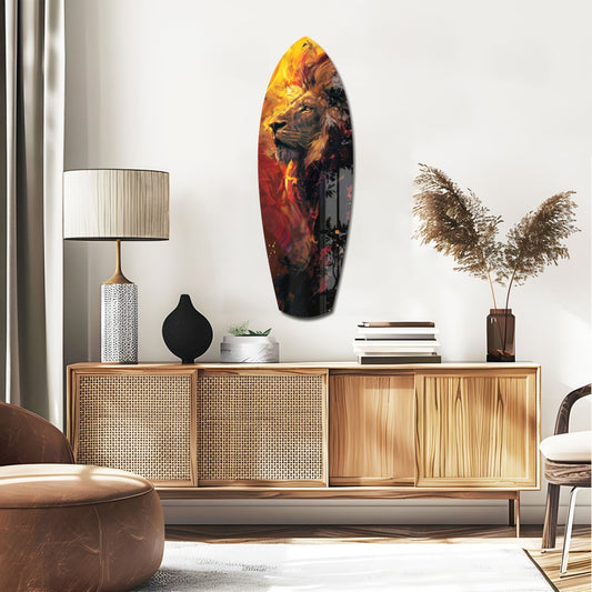 Fiery lion surfboard glass wall art above a rattan sideboard with a table lamp and pampas grass