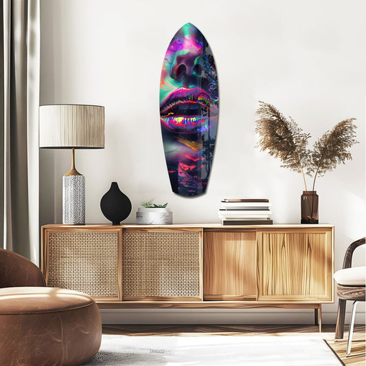 Rainbow gloss lips surfboard glass wall art above a rattan sideboard with a table lamp and pampas grass