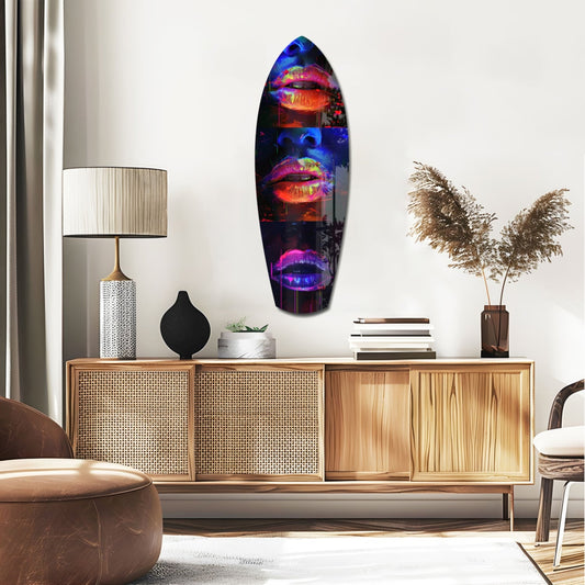 Triple neon lips surfboard glass wall art above a rattan sideboard with a table lamp and pampas grass