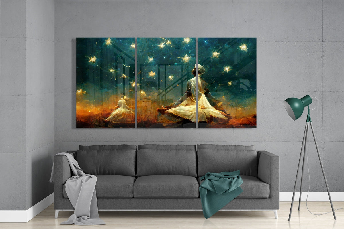 Meditation under stars 3-panel glass wall art set above a gray sofa beside a teal floor lamp