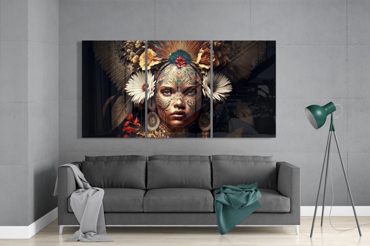 Floral headdress woman glass wall art set above a gray sofa with a green floor lamp