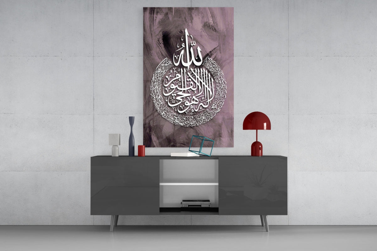 Plum Ayatul Kursi calligraphy glass wall art above a gray sideboard with a red table lamp