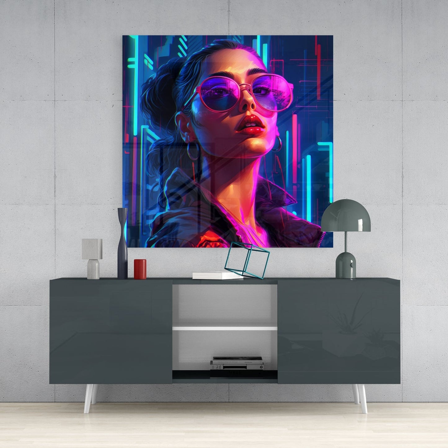 Neon city woman glass wall art above a dark gray sideboard on a pale concrete wall