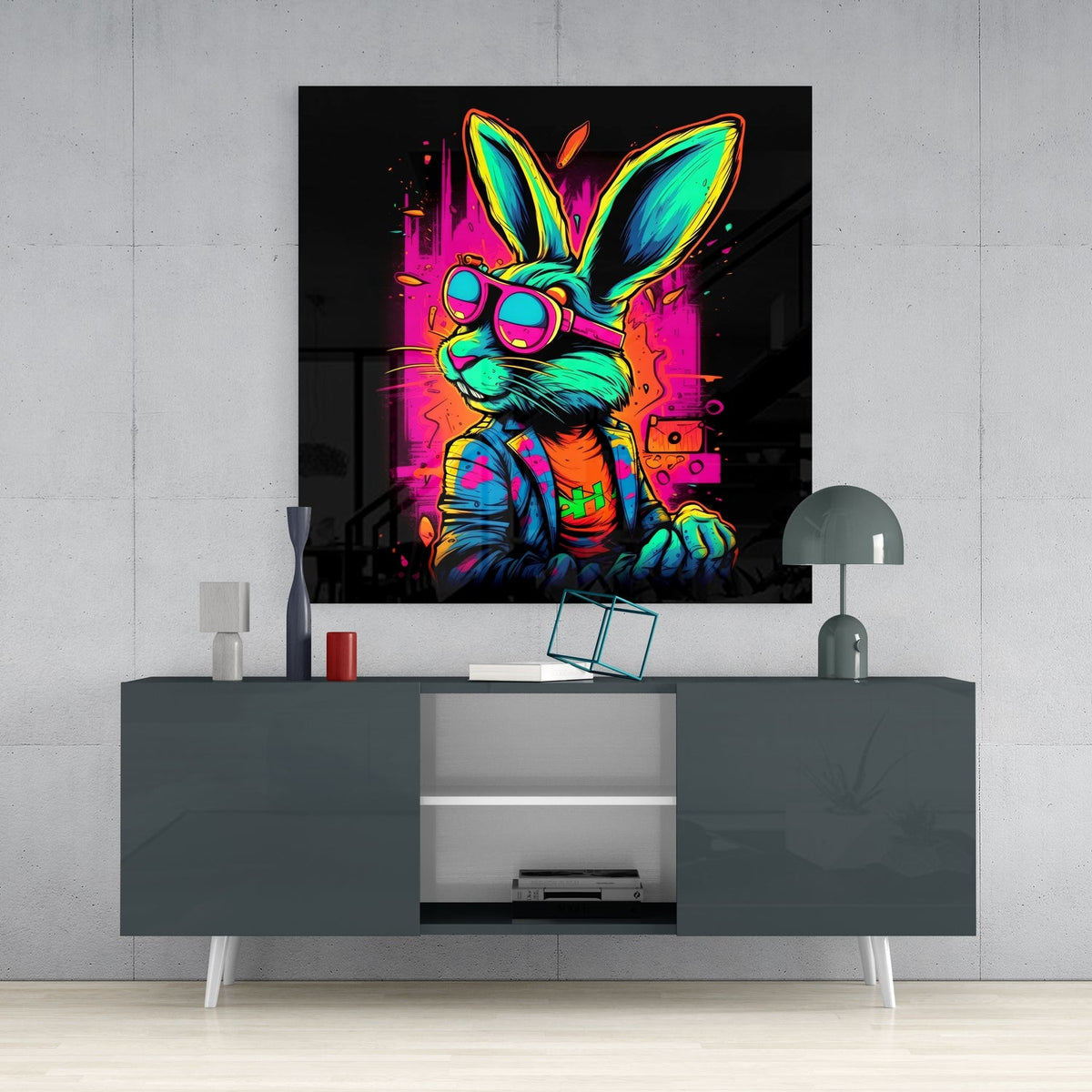 Neon rabbit glass wall art on a concrete wall above a dark gloss sideboard with a dome lamp