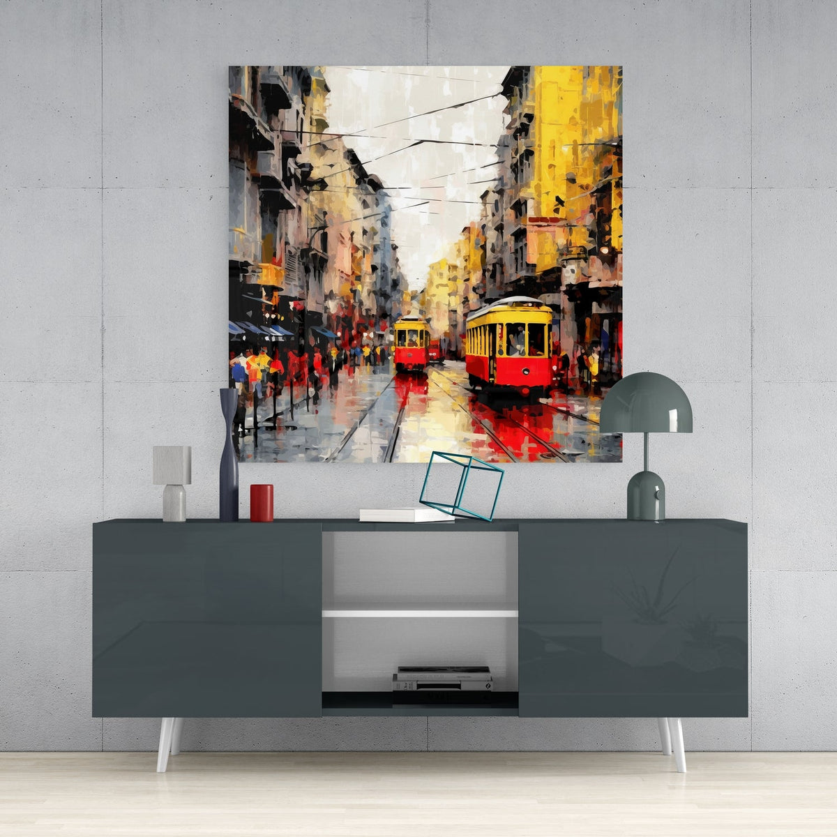 Yellow tram on a rainy avenue glass wall art above a gray sideboard with a small lamp