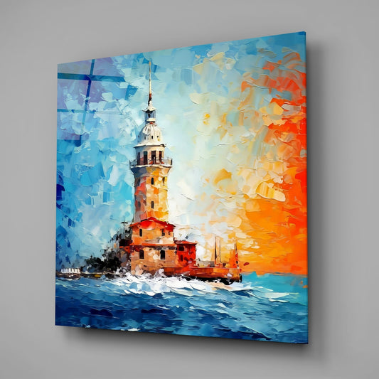Blue and orange sea tower glass wall art on a pale gray wall with a window reflection on the glass