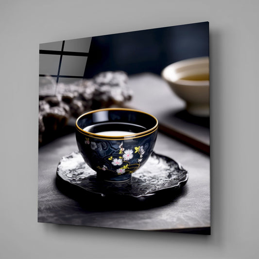 Porcelain tea cup still life glass wall art on a gray wall with soft window light