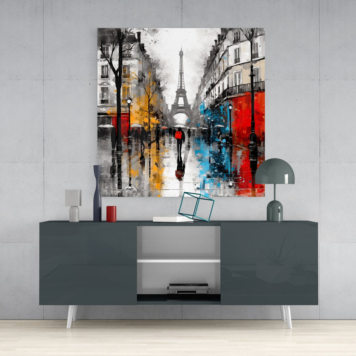 Rainy Paris boulevard glass wall art above a dark gray sideboard with a dome lamp and vase