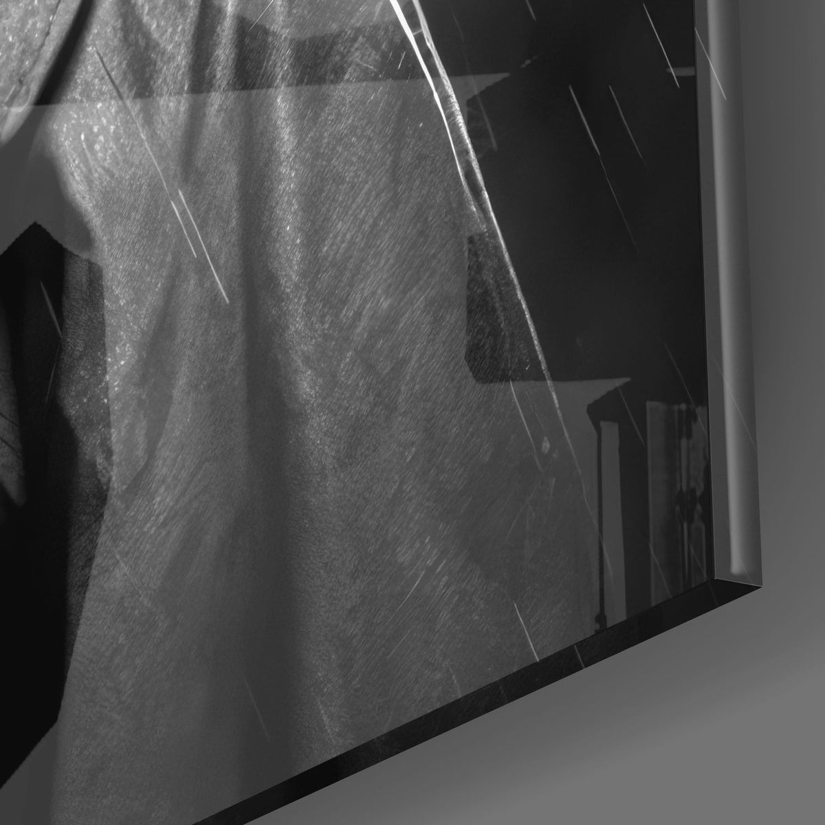 Close-up of the glossy tempered glass edge on the noir detective cat glass wall art