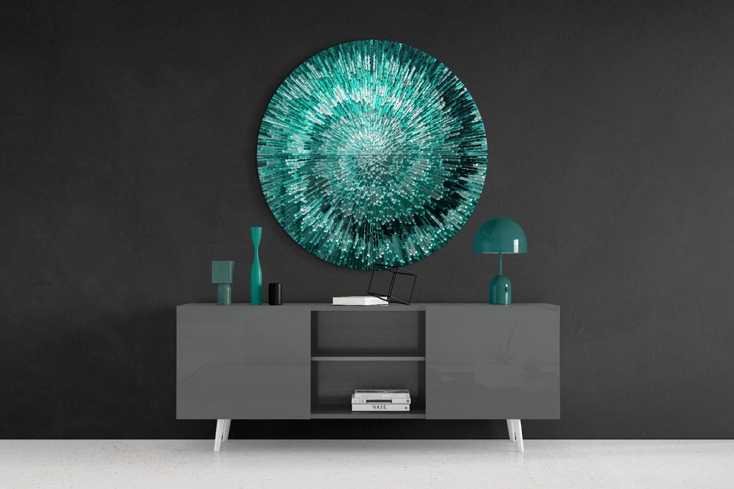 Emerald helix burst round glass wall art on a dark wall above a gray sideboard with vases