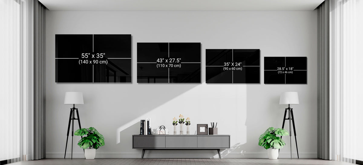 Size guide showing 55x35, 43x27.5, 35x24 and 28.5x18 inch glass pieces on a wall above a gray console between tripod lamps
