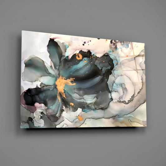 Teal alcohol ink flower glass wall art on a plain gray wall
