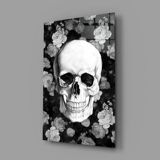 Black and white skull and roses glass wall art on a gray wall with a glossy reflection