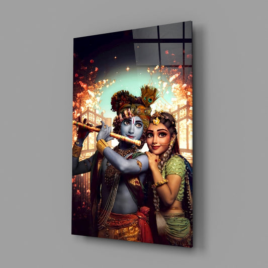 Krishna and Radha glass wall art on a gray wall, angled to show the glossy front