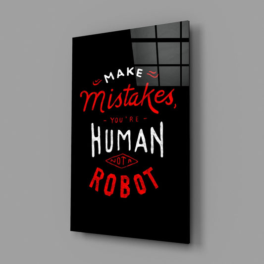 Make mistakes typography glass wall art on a gray wall with a soft window reflection