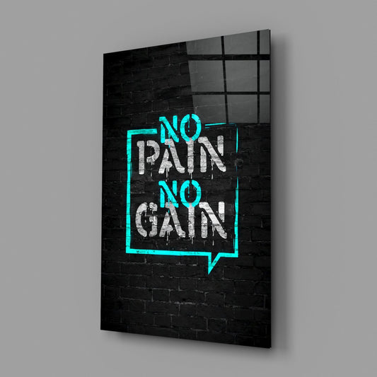 No pain no gain turquoise graffiti glass wall art on a gray wall with a soft window reflection