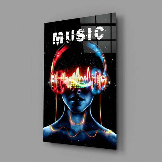 Neon headphones face glass wall art on a gray wall, light reflecting off the glossy front