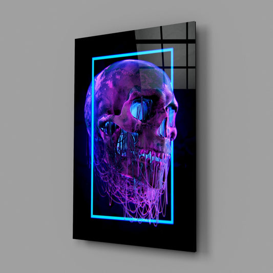 Neon skull glass wall art on a gray wall, light reflecting off the glossy front