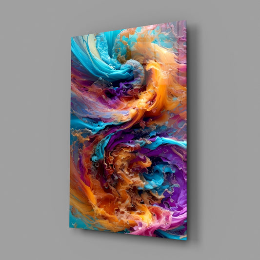 Turquoise and orange fluid swirl glass wall art on a gray wall, light reflecting off the glossy front