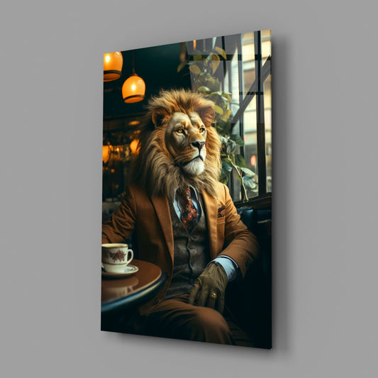 Lion in tweed suit glass wall art on a gray wall, light reflecting off the glossy front
