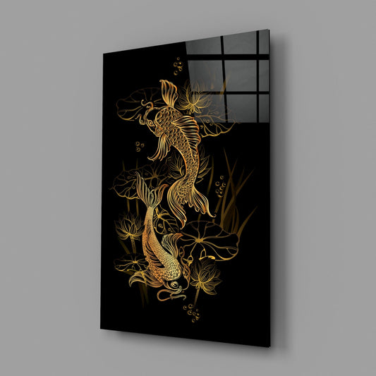 Two golden koi fish glass wall art on a gray wall, angled to show the glossy front