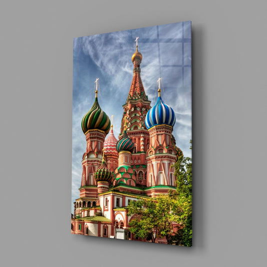 Saint Basil's Cathedral glass wall art on a plain gray wall, angled to show the glossy surface