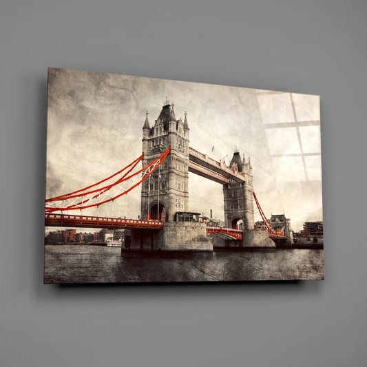Tower Bridge glass wall art on a plain gray wall, angled to show the glossy surface