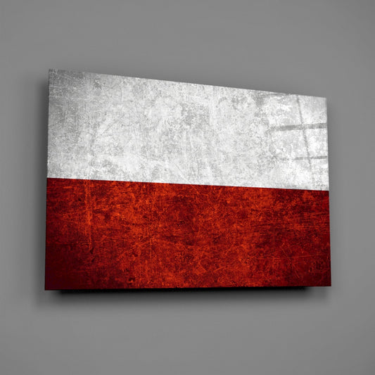 Rustic grunge Poland flag glass wall art angled on a gray backdrop with light reflecting off the glossy front