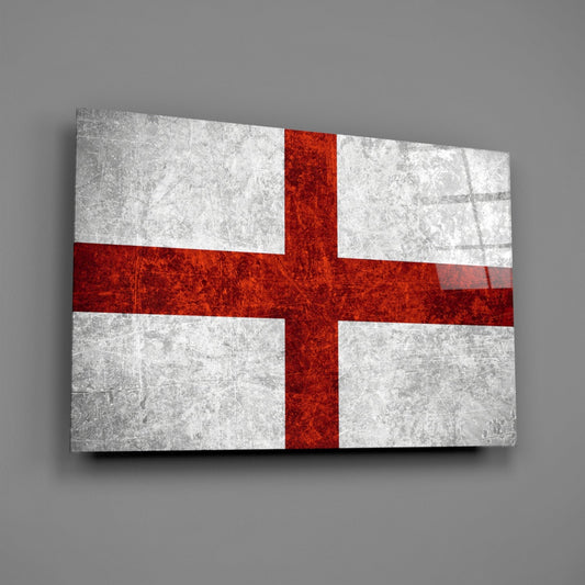 Crimson cross England flag glass wall art angled on a gray backdrop with light reflecting off the glossy front