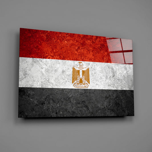 Weathered Egypt flag glass wall art on a gray wall with a window reflection across the glossy glass