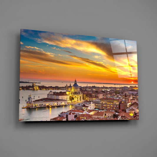 Venice rooftops glass wall art on a plain gray wall, angled to show the glossy surface